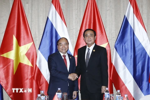 Thủ tướng Nguyễn Xuân Phúc tiếp Thủ tướng Thái Lan Prayuth Chan-ocha. (Ảnh: TTXVN)