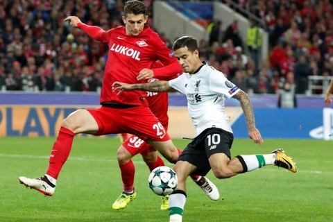 Liverpool (áo trắng) sẽ quyết đấu Spartak Moscow để tranh vé vào vòng 1/8. (Nguồn: AP)