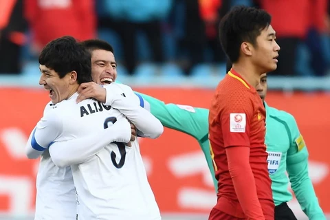 U23 Uzbekistan ăn mừng sau khi làm tung lưới U23 Trung Quốc. (Nguồn: AFC)