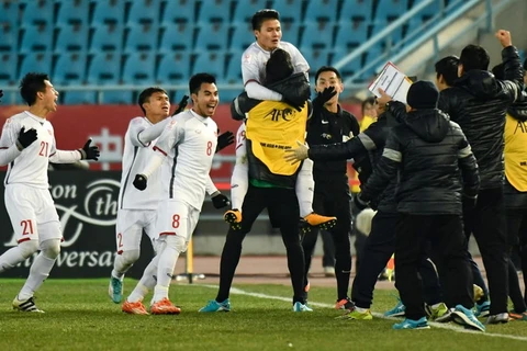 Niềm vui của các cầu thủ U23 Việt Nam và ban huấn luyện. (Nguồn: AFC)