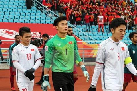 Thủ môn Tiến Dũng (giữa) là người góp công lớn giúp U23 Việt Nam đi tới chung kết. (Nguồn: THX/TTXVN)
