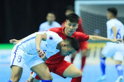 Tuyển Futsal Việt Nam (áo đỏ) thua trận ở những giây cuối. (Nguồn: AFC)