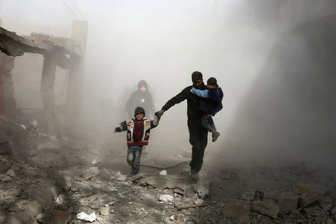 Các dân thường Syria chạy trốn các cuộc không kích. (Nguồn: AFP/Getty Images)