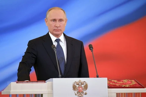 Tổng thống Vladimir Putin đọc lời tuyên thệ nhậm chức tại điện Kremlin ngày 7/5. (Nguồn: AFP/TTXVN)