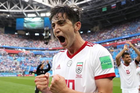 Niềm vui của cầu thủ Iran sau chiến thắng. (Nguồn: Getty Images)