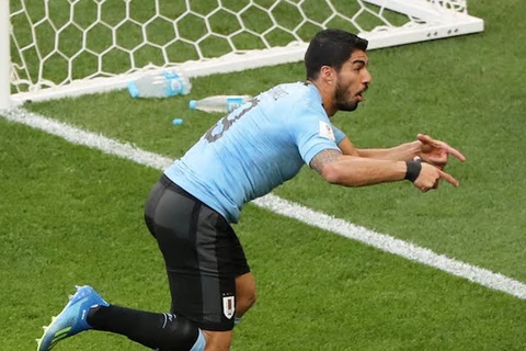 Saurez ghi bàn mở tỷ số cho Uruguay. (Nguồn: Getty Images)