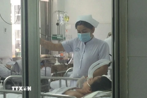 Bệnh nhân nhiễm cúm A/H1N1 điều trị tại Bệnh viện Chợ Rẫy. (Ảnh: Đinh Hằng/TTXVN)