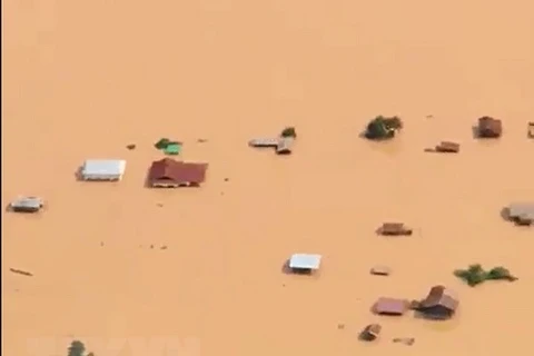 Cảnh ngập lụt sau khi đập thủy điện Xepian-Xe Nam Noy tại tỉnh Attapeu, Lào bị vỡ ngày 24/7. (Nguồn: AFP/TTXVN)