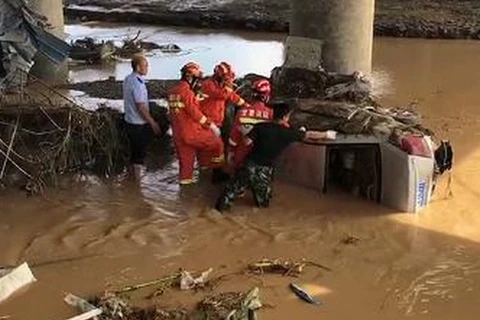 Lực lượng cứu hộ khắc phục sau mưa lớn. (Nguồn: cgtn.com)