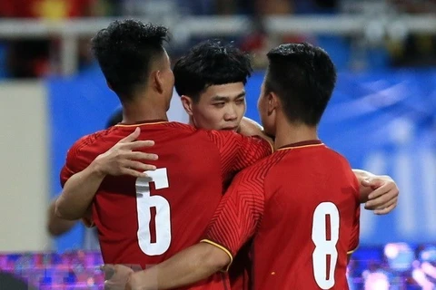Olympic Việt Nam sẽ mặc trang phục đỏ khi đá trận ra quân. (Ảnh: Trọng Đạt/TTXVN)