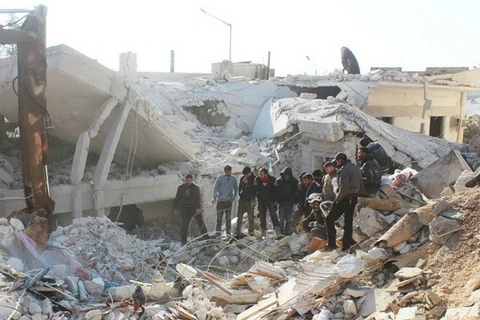 Cảnh đổ nát ở Syria sau các cuộc không kích. (Nguồn: AP)
