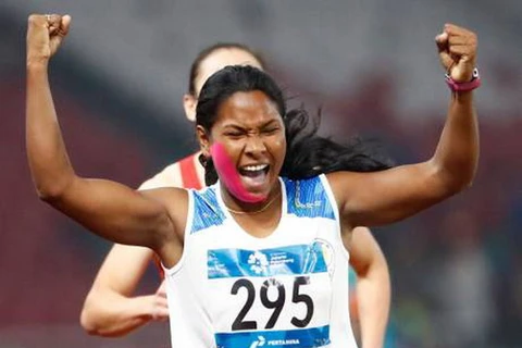 Swapna Barman vô địch với đôi chân không bình thường. (Nguồn: AP)