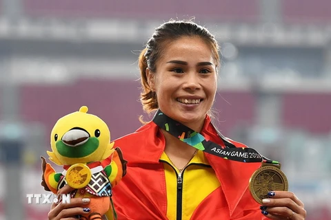 Vũ Thị Mến giành Huy chương đồng ở nội dung nhảy ba bước nữ. (Ảnh: AFP/TTXVN)