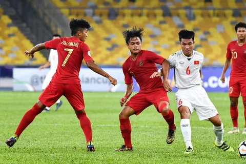 U16 Việt Nam (áo trắng) không có quyền tự quyết ở lượt cuối. (Nguồn: AFC)