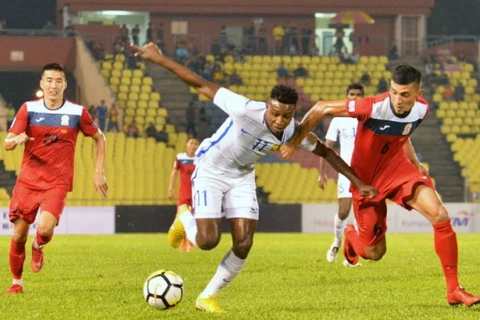 Malaysia (áo trắng) thua trước thềm AFF Cup. (Nguồn: AP)