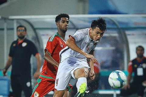Đoàn Văn Hậu trong trận đấu với U23 Oman. (Ảnh: Trọng Đạt/TTXVN)