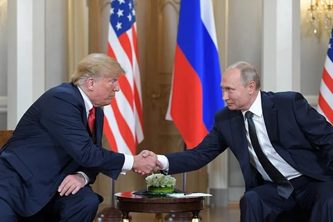 Tổng thống Mỹ Trump và người đồng cấp Nga Putin. (Nguồn: Sputnik)