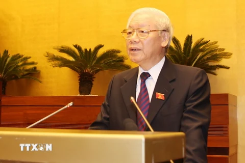 Tổng Bí thư, Chủ tịch nước Nguyễn Phú Trọng trình bày Tờ trình về việc đề nghị Quốc hội phê chuẩn Hiệp định CPTPPcùng các văn kiện liên quan. (Ảnh: Trí Dũng/TTXVN)