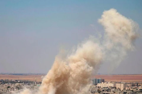 Khói bốc lên sau một cuộc không kích ở Syria. (Nguồn: AFP)