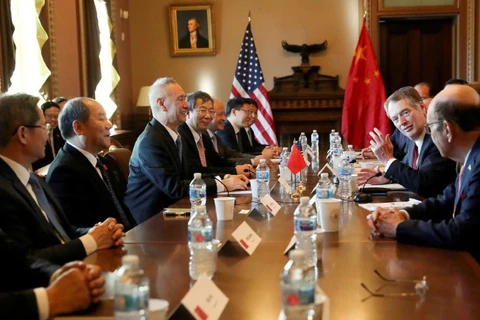 Quan chức Mỹ và Trung Quốc đàm phán. (Nguồn: New Straits Times)