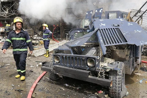 Hiện trường một vụ nổ ở Baghdad. (Nguồn: Reuters)