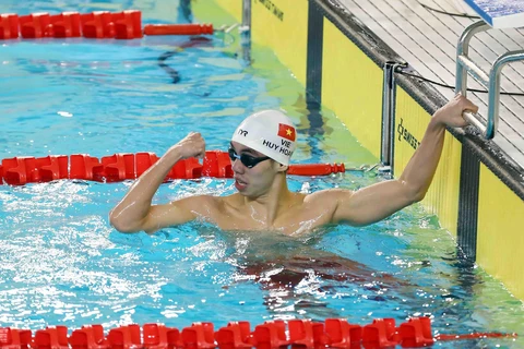 Niềm vui của Nguyễn Huy Hoàng sau khi giành HCV và phá kỷ lục SEA Games nội dung 400m bơi tự do nam. (Ảnh: Phạm Kiên/TTXVN)