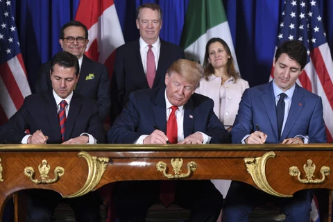 Các nhà lãnh đạo Mỹ, Mexico và Canada ký kết hiệp định USMCA tại Buenos Aires, Argentina (Nguồn: AFP/TTXVN)