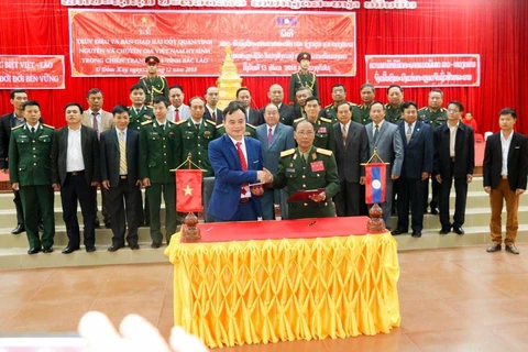 Lễ bàn giao hài cốt quân tình nguyện và chuyên gia Việt Nam hy sinh tại khu vực 6 tỉnh miền Bắc Lào, tổ chức tại Udomxay hồi tháng 12/2018. (Ảnh: Tapchilaoviet)