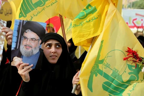 Người ủng hộ phong trào Hezbollah. (Ảnh: Reuters)