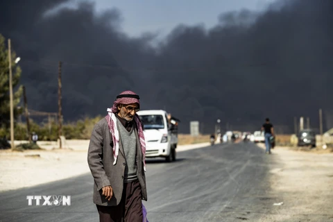 Giao tranh vẫn xảy ra ác liệt tại Ras al-Ain. (Ảnh: AFP/TTXVN) 
