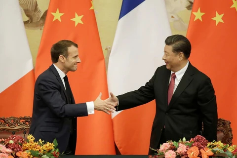Chủ tịch Trung Quốc Tập Cận Bình và Tổng thống Pháp Emmanuel Macron. (Ảnh: Reuters)