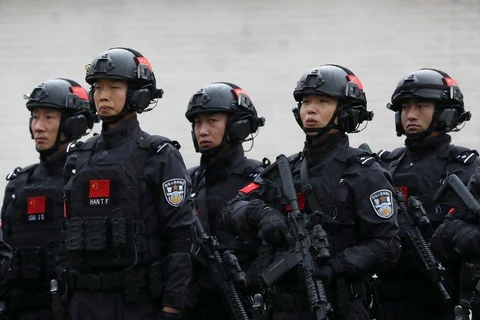Lực lượng đặc nhiệm Trung Quốc tham gia diễn tập tại Serbia. (Ảnh: AP)