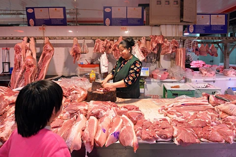 Một cửa hàng thịt tại Trung Quốc. (Ảnh: AFP)