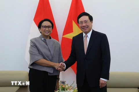 Phó Thủ tướng, Bộ trưởng Ngoại giao Phạm Bình Minh và Bộ trưởng Bộ Ngoại giao Indonesia Retno Marsudi. (Ảnh: Lâm Khánh/TTXVN)