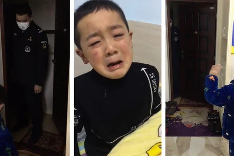 Cậu bé Trung Quốc bật khóc khi gặp cha vắng nhà đi phòng COVID-19