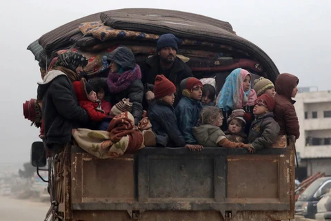Người dân Syria rời bỏ nhà cửa do xung đột. (Ảnh: Reuters)