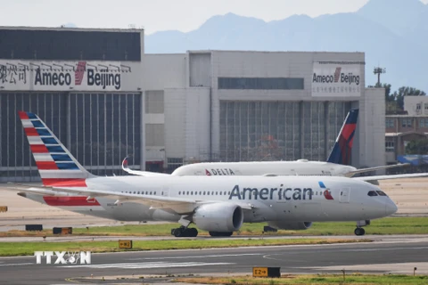 American Airlines nỗ lực khắc phục thiệt hại do COVID-19 gây ra. (Ảnh: AFP/TTXVN)