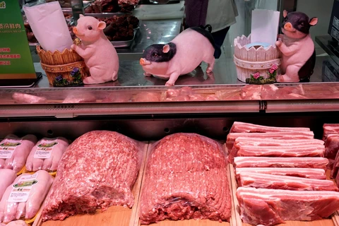 Một cửa hàng thịt lợn tại Trung Quốc. (Ảnh: Reuters)