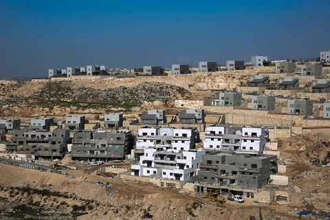 Israel tạm dừng tuyên bố chủ quyền ở các khu định cư Bờ Tây. (Ảnh: AP) 