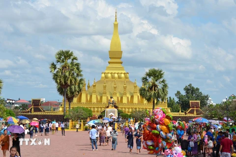 Người dân tại thủ đô Vientiane. (Ảnh: Thu Phương/TTXVN)