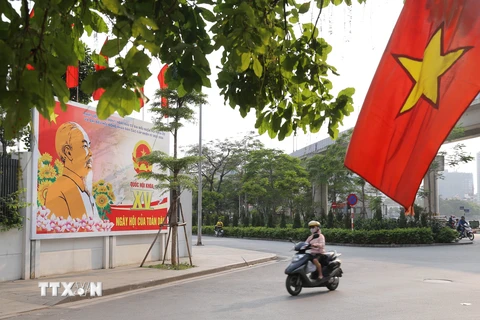 Tranh tuyên truyền, cổ động bầu cử tại Hà Nội. (Ảnh: Hoàng Hiếu/TTXVN)