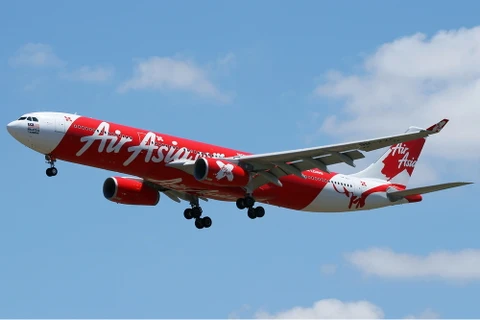 Lượng khách AirAsia chuyên chở tăng 25% trong năm 2013