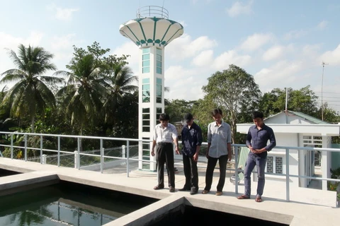 Sau khi hoàn thành, dự án sẽ góp phần cung cấp nước sạch cho gần 23.000 người dân ngoại thành Hà Nội. (Ảnh: TTXVN)