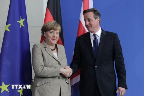 Thủ tướng Anh David Cameron trong chuyến thăm Đức thảo luận về kế hoạch cải cách EU. (Ảnh: Mạnh Hùng/TTXVN)
