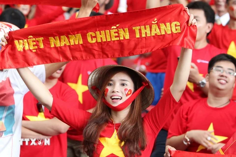 Cổ động viên luôn ủng hộ hết mình cho đội tuyển U23 Việt Nam. (Ảnh: Quốc Khánh/TTXVN)