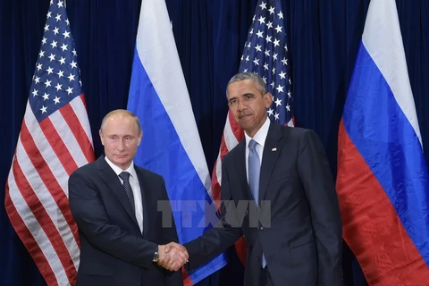 Tổng thống Nga Vladimir Putin (trái) và Tổng thống Mỹ Barack Obama có cuộc hội đàm bên lề cuộc họp của Đại hội đồng Liên hợp quốc ngày 29/9. (Ảnh: AFP/TTXVN)