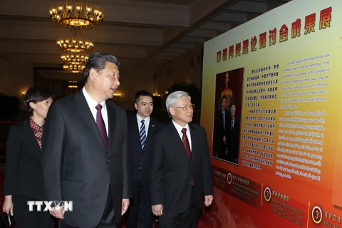 Tổng Bí thư, Chủ tịch nước Trung Quốc Tập Cận Bình và Tổng Bí thư Nguyễn Phú Trọng. (Ảnh: TTXVN)