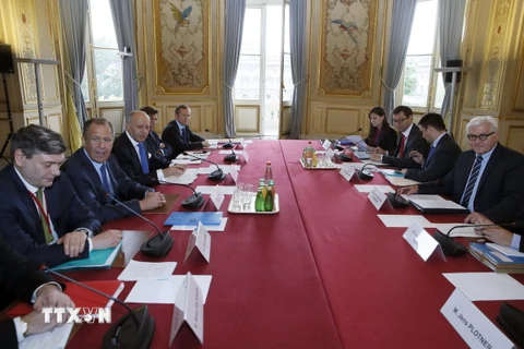 Ngoại trưởng nhóm Bộ tứ Normandy tại cuộc họp ngày 23/6. (Ảnh: AFP/TTXVN)