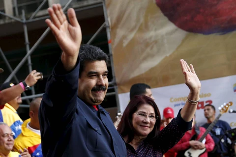 Tổng thống Maduro cùng đệ nhất phu nhân Cilia Flores. (Ảnh: Reuters)