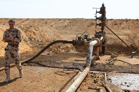 Một giếng dầu mà quân chính phủ Syria chiếm lại từ tay tổ chức IS. (Ảnh: AFP)